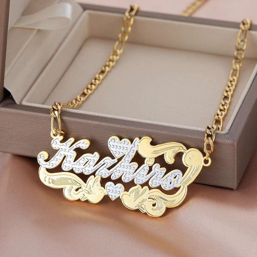 a gold necklace with a name on it