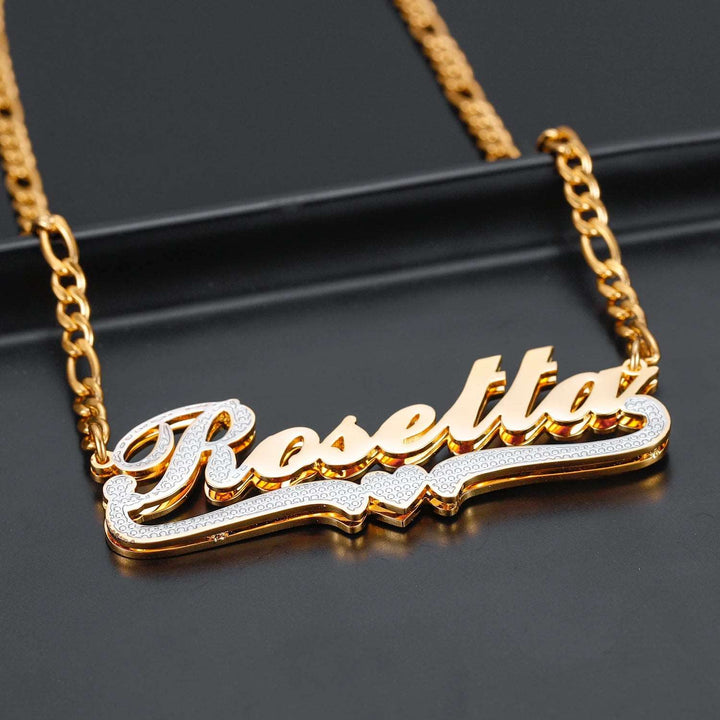 a gold necklace with the word rosetta on it