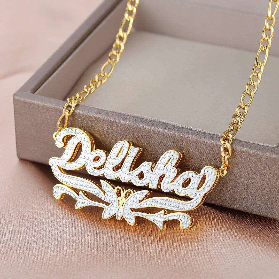 a necklace with the word delisho on it