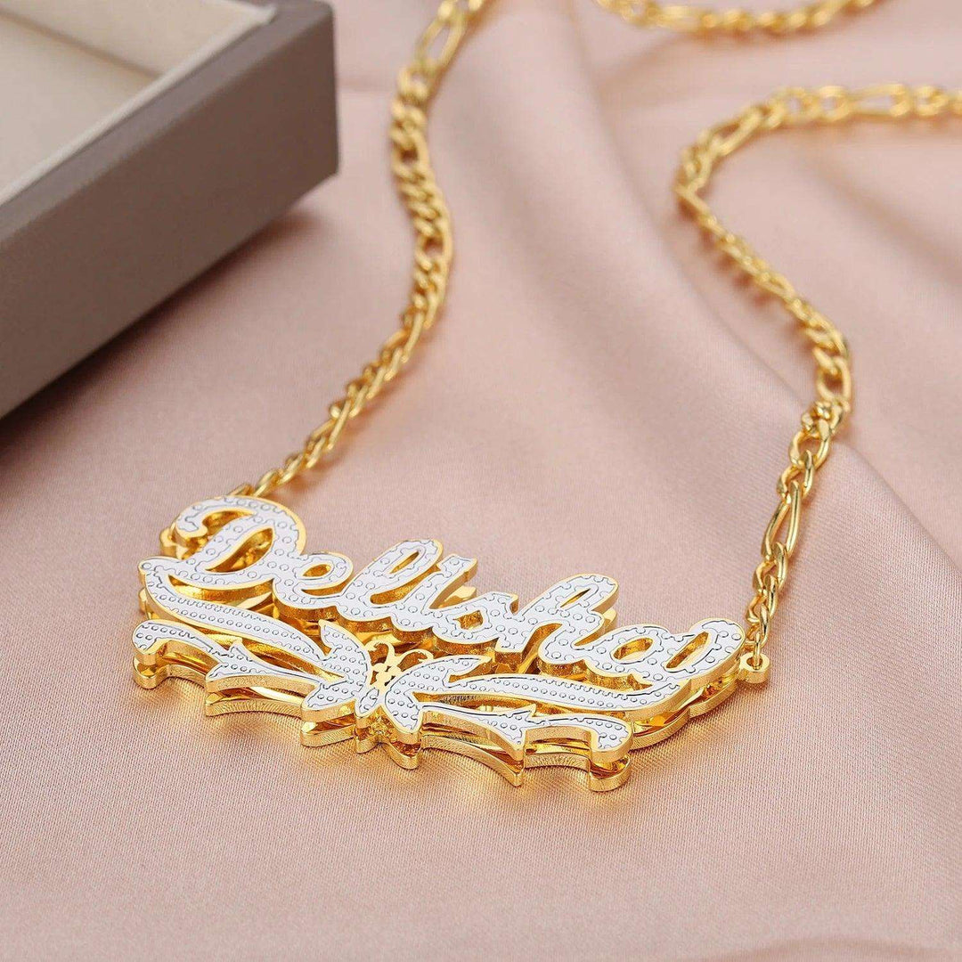 a gold necklace with the word bead on it