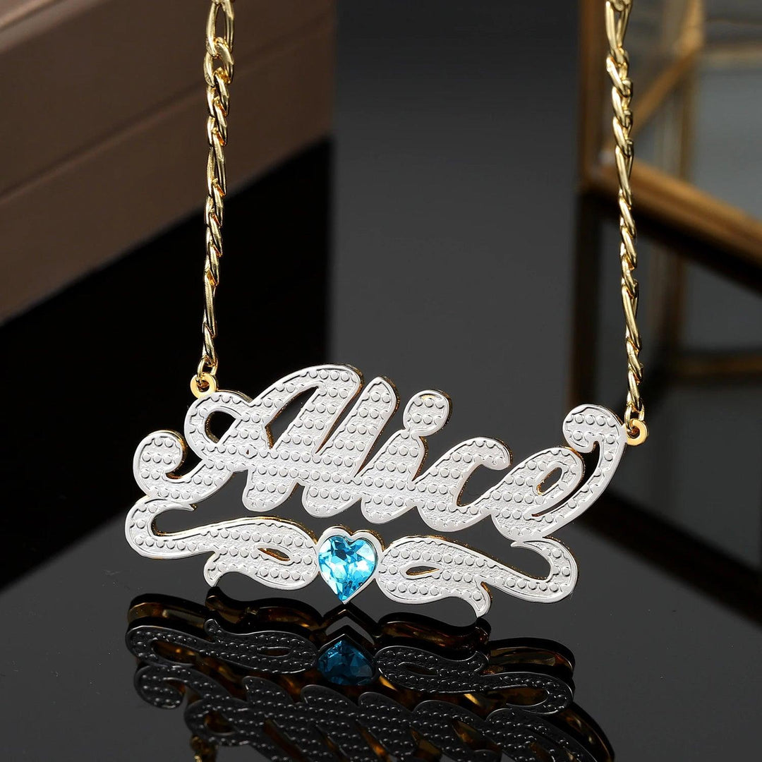 a necklace with the word alice on it