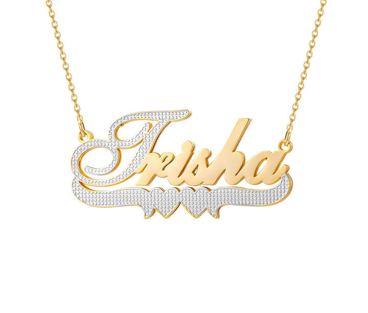 a gold plated name necklace with a name on it