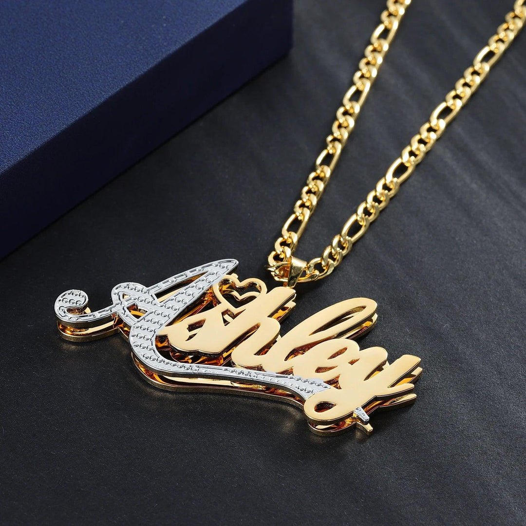 a gold necklace with a name on it